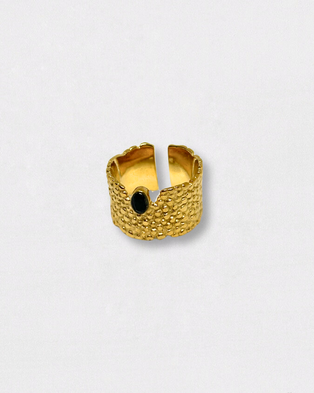 Anillo de acero inoxidable y oro, con piedra negra