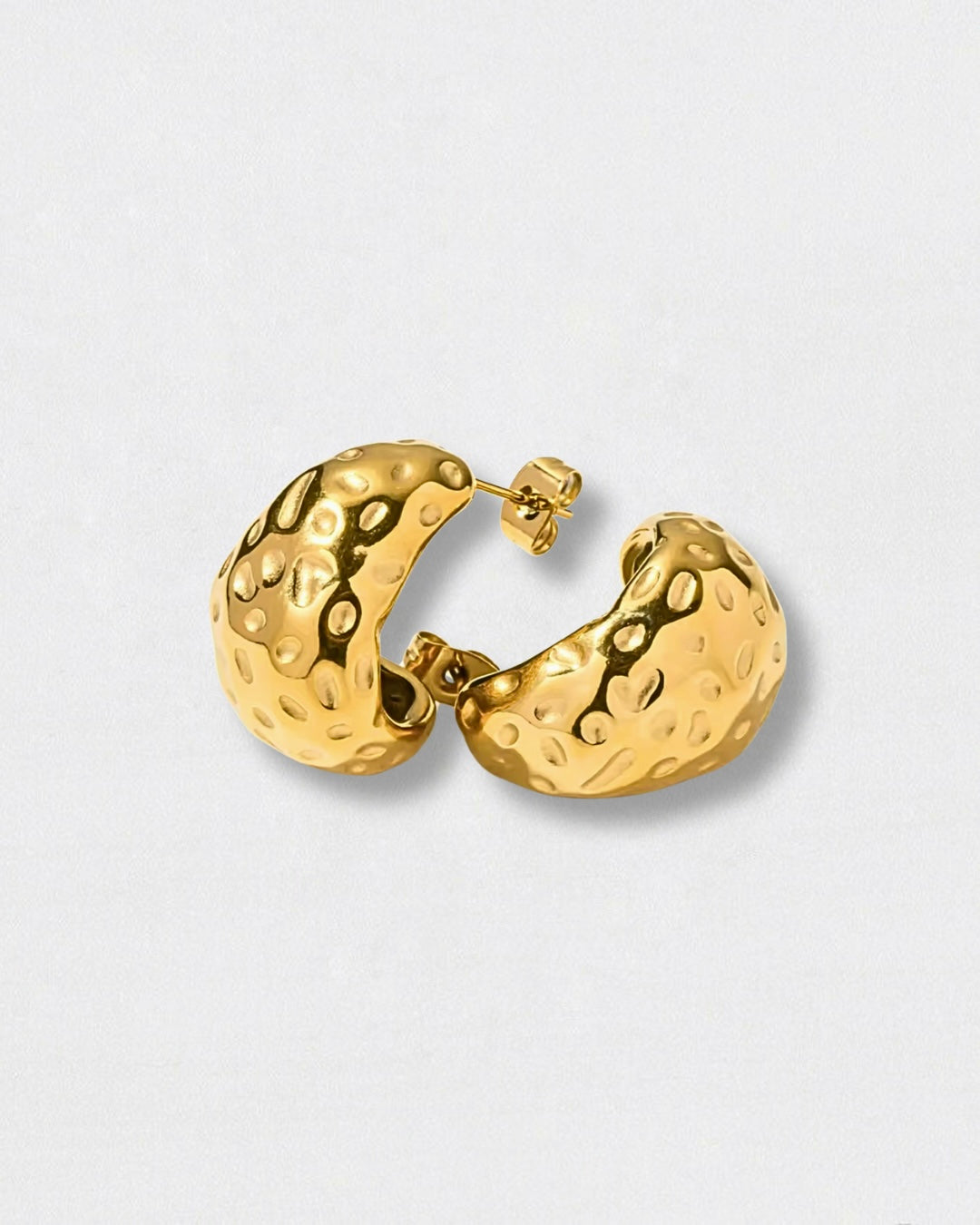 Pendientes labrados de acero inoxidable y bano de oro