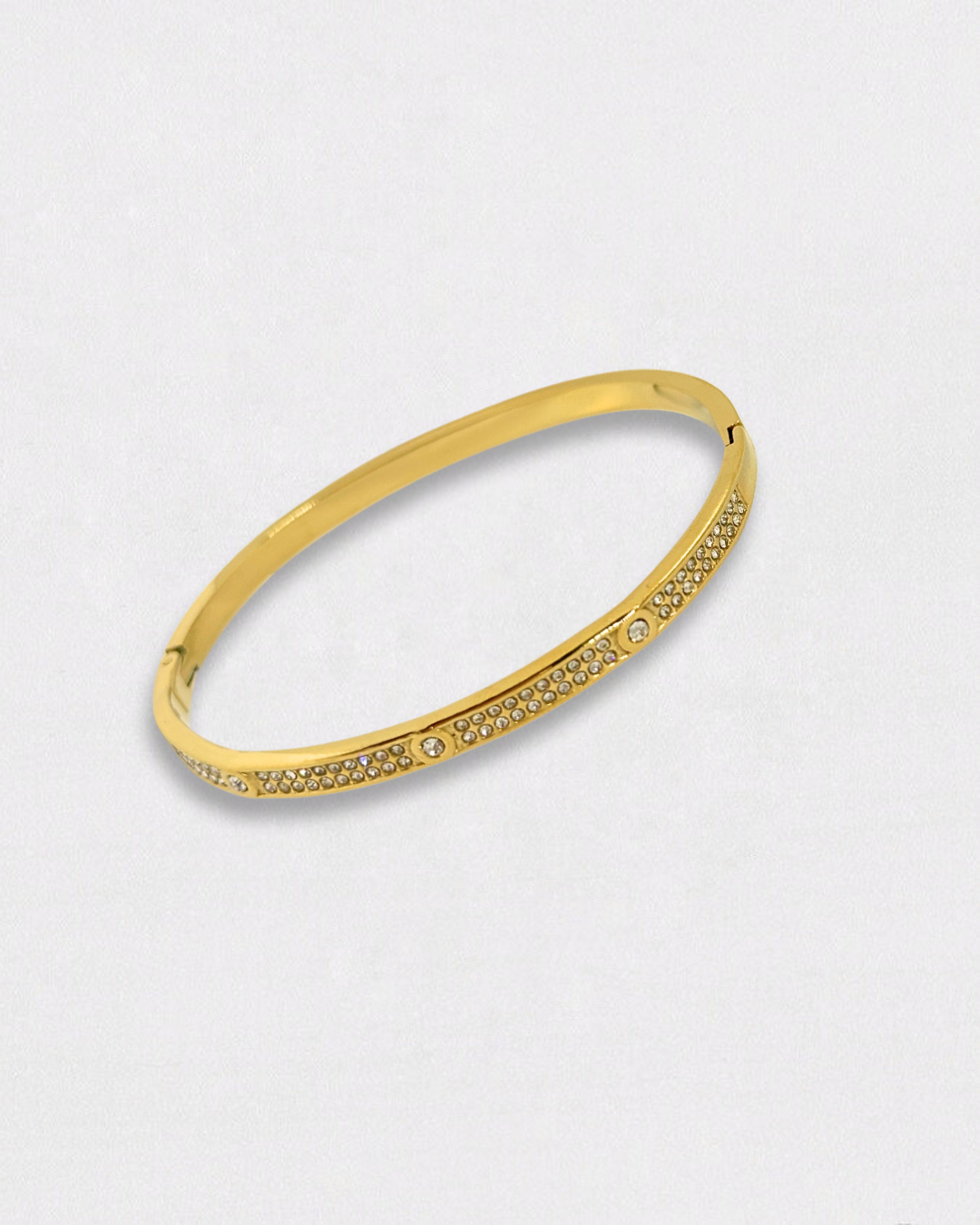 Pulsera de acero inoxidable y oro con circonitas