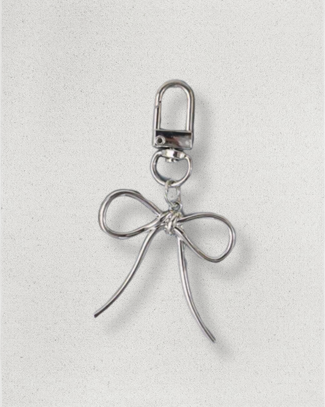 Charm Lazo plateado