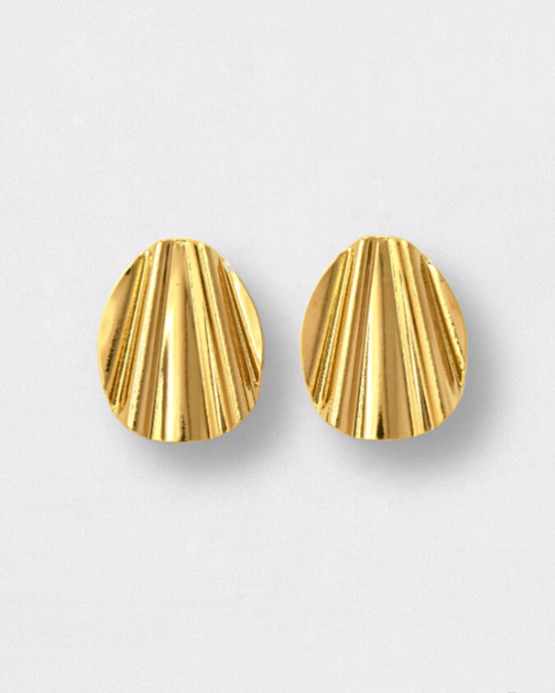 Pendientes grandes con textura de acero inoxidable y bano de oro